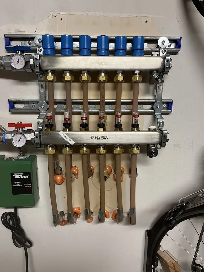 Plumber performing Water Heater Repair at a residential property in Riverdale Park